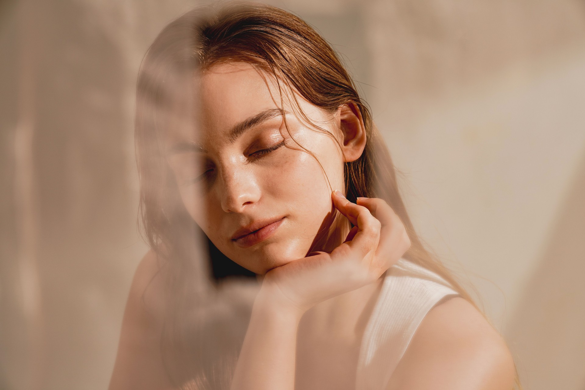 Natural beauty portrait of a young western woman shot in warm tones